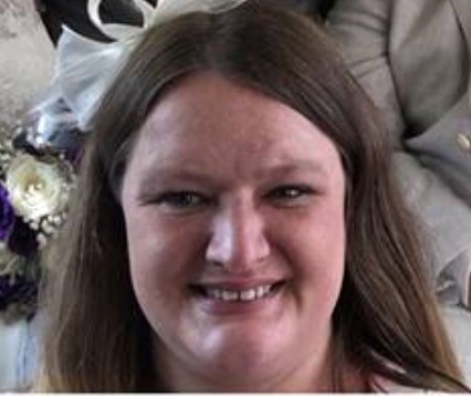 Smiling woman with long hair